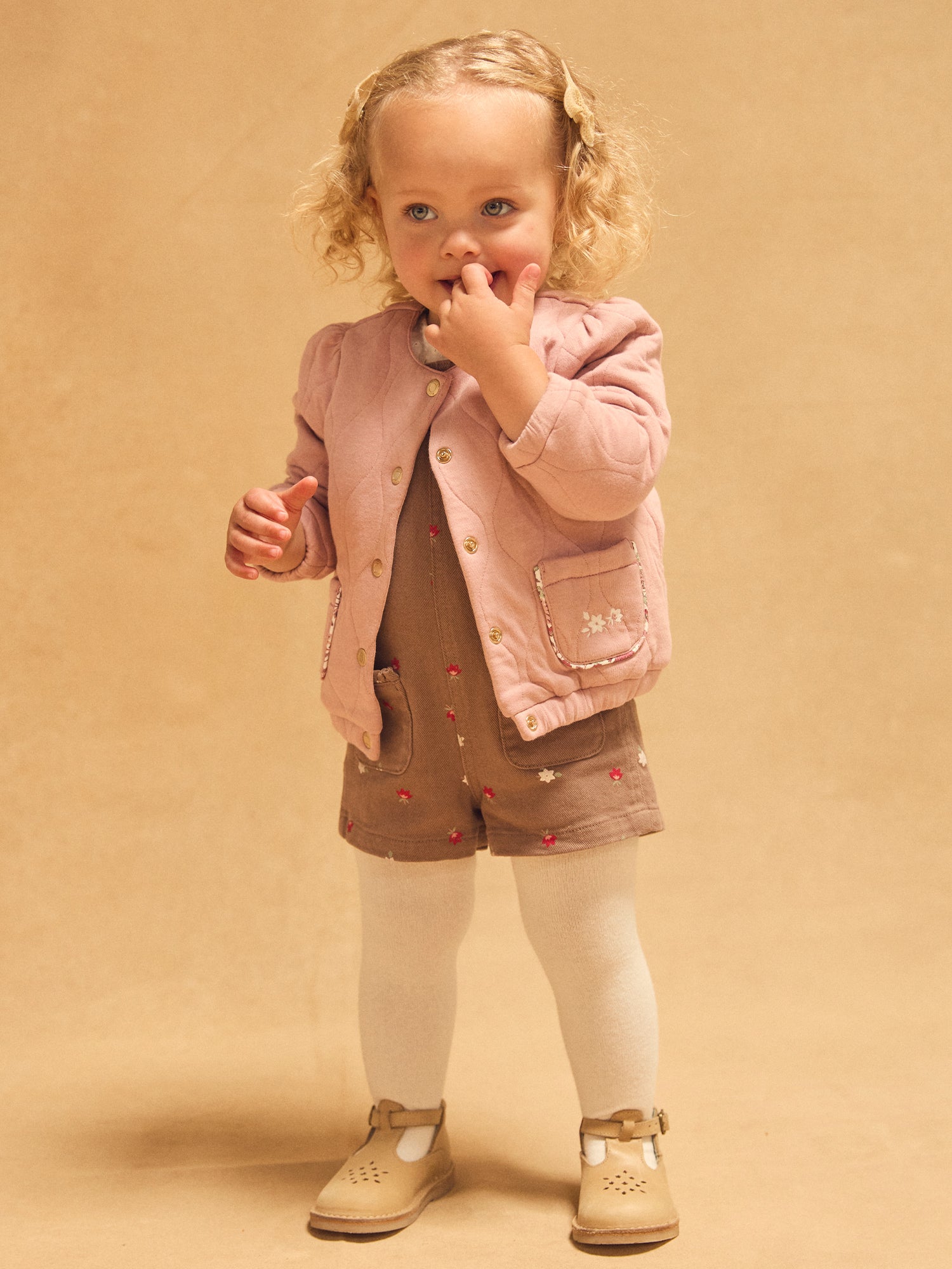 Cardigan matelassado rosa pálido para bebés meninas