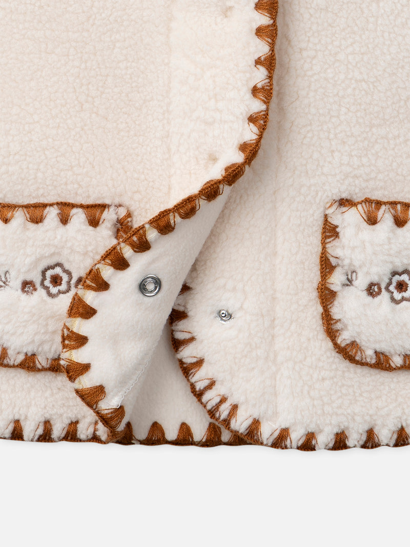 Cardigan ecru sem mangas para bebé rapariga