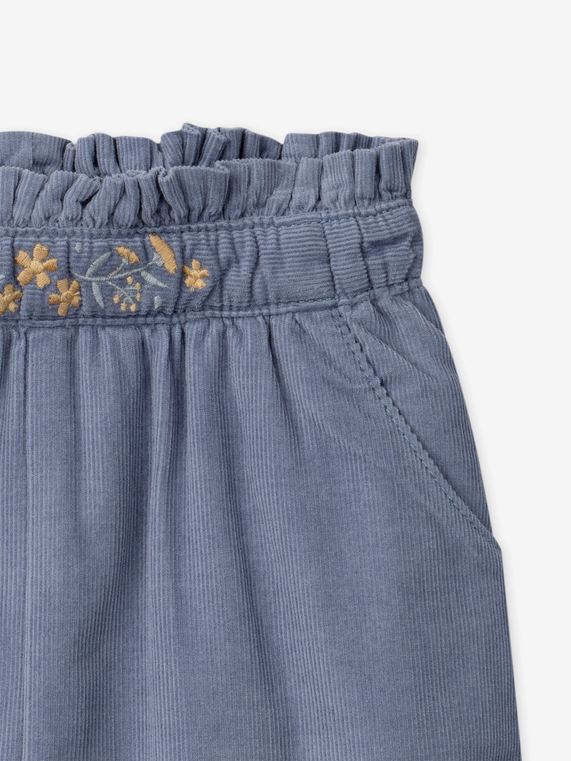 Calças de veludo azul para menina