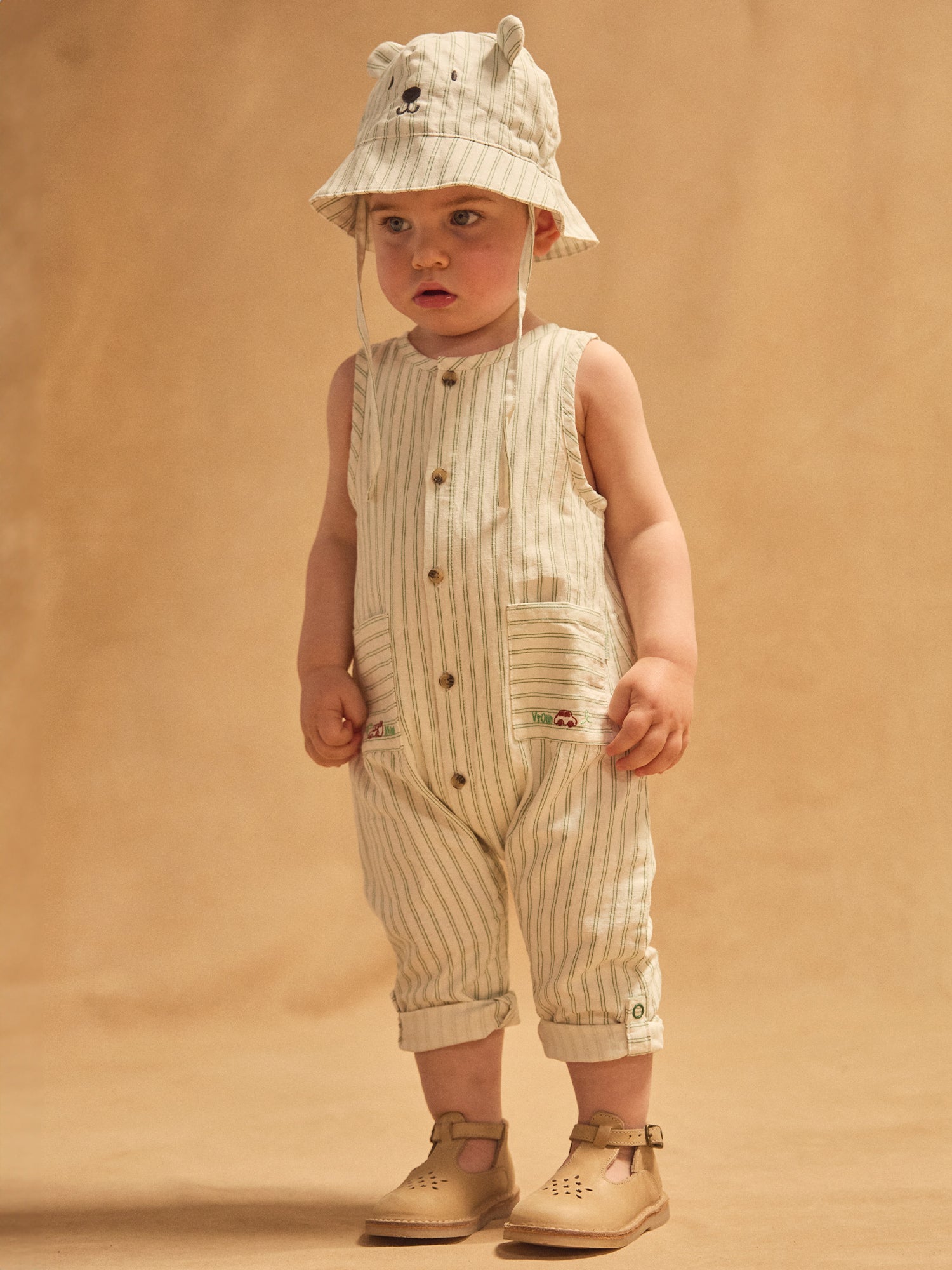 Macaquinho branco com listras verdes bebé menino.