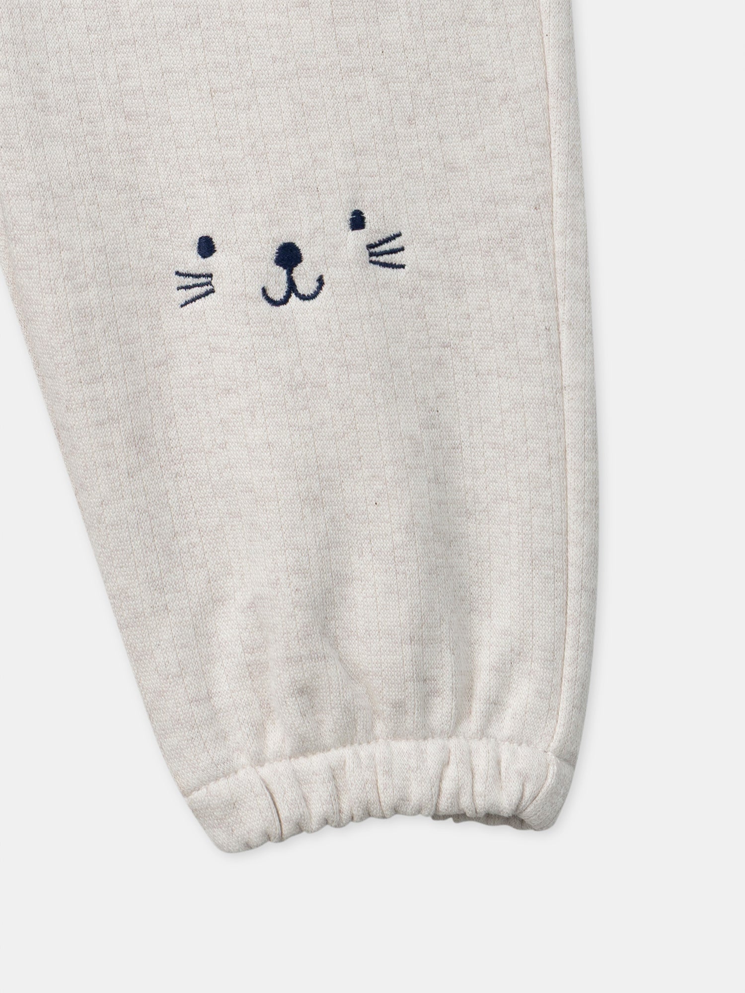 Calças ecru com rosto de animal para bebé menino