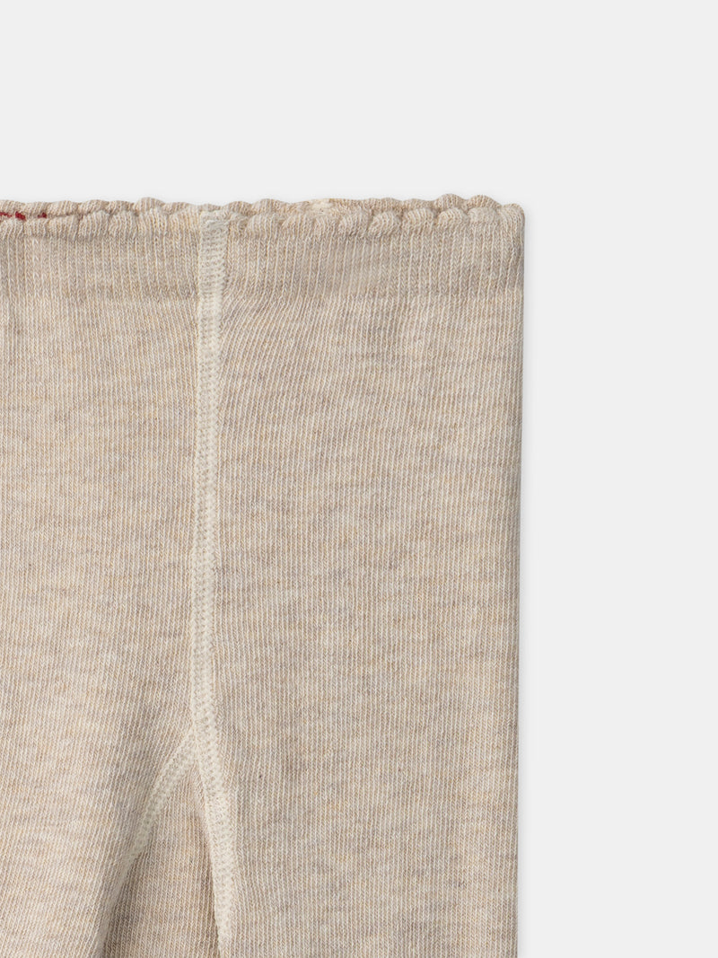 Collant bege com padrão floral para menina