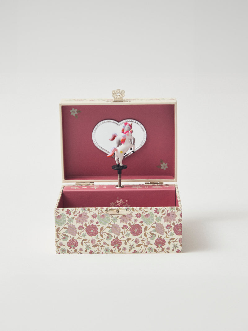 Caixa de música de unicórnio com padrão floral