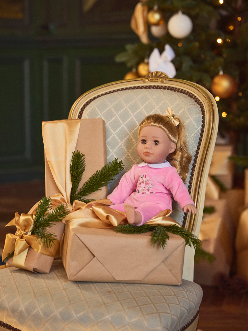 Pijama rosa de boneca em veludo com estampa de Natal