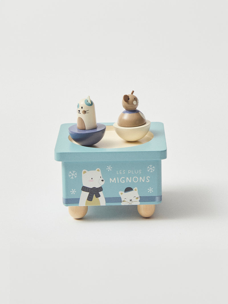 Caixa de música azul com impressão de animais