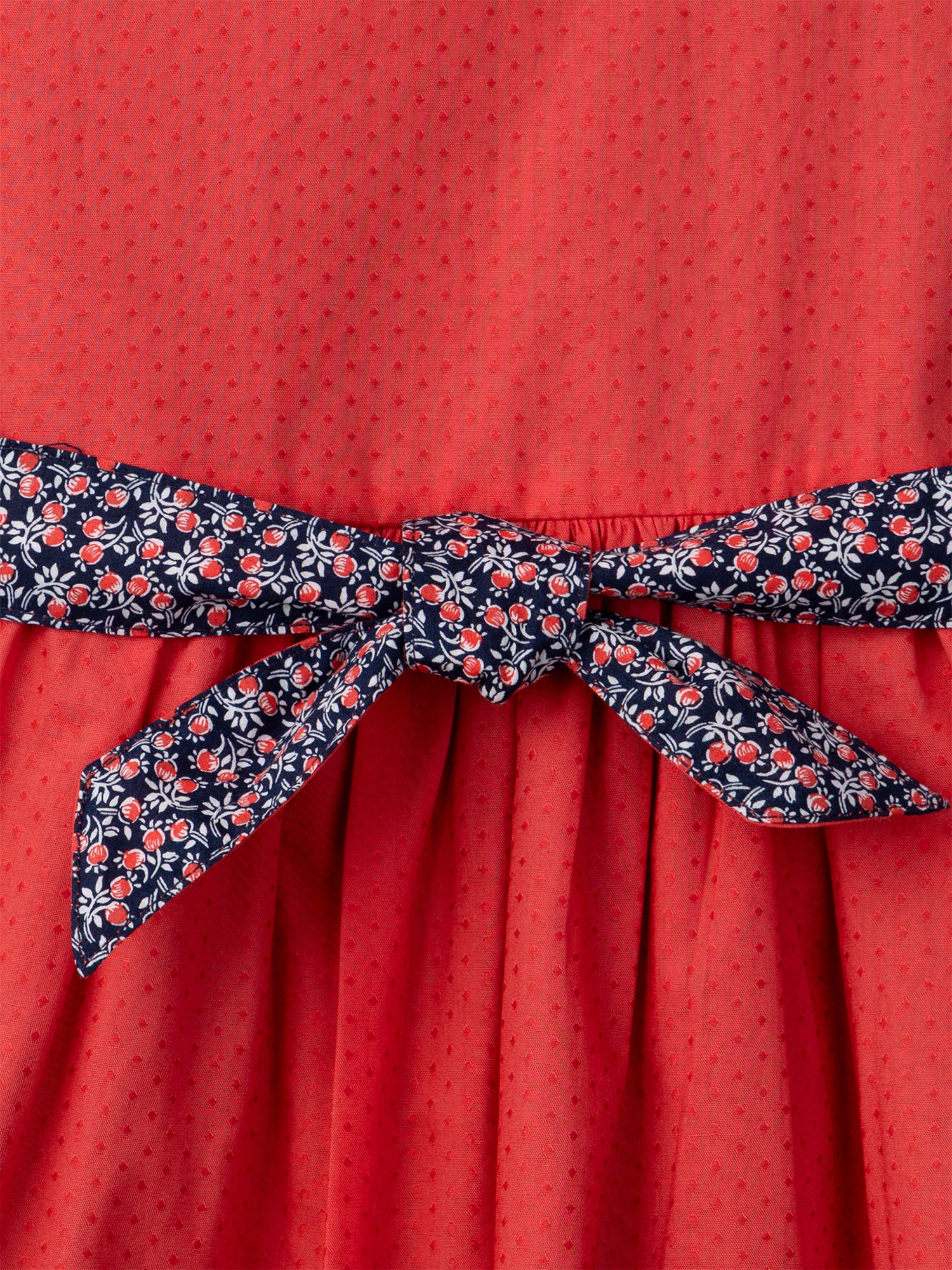 Vestido Reversível Vermelho ou com Estampa Floral para Menina