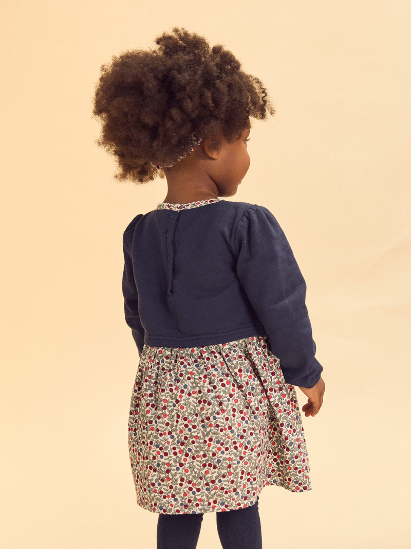 Vestido bimaterial com parte de cima azul-marinho e parte de baixo com impressão de bagas Bebé Menina