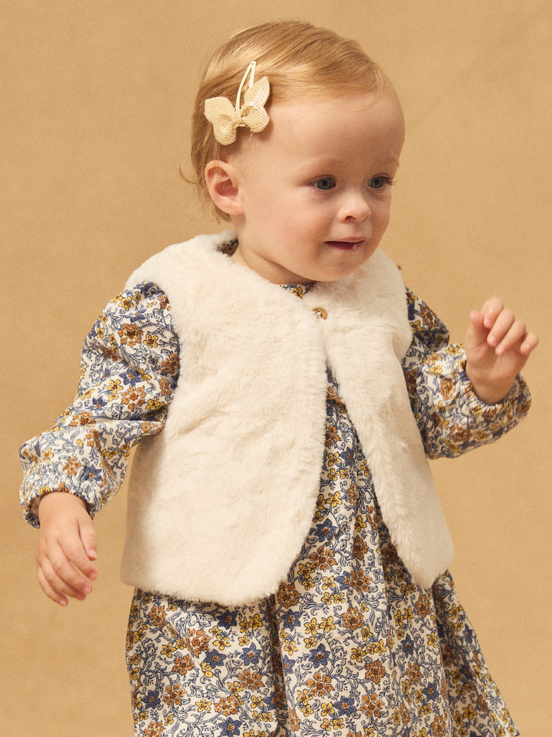 Gilet reversível branco de pele ou estampado floral para menina