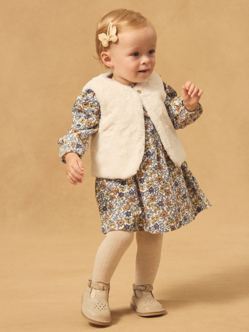 Gilet reversível branco de pele ou estampado floral para menina