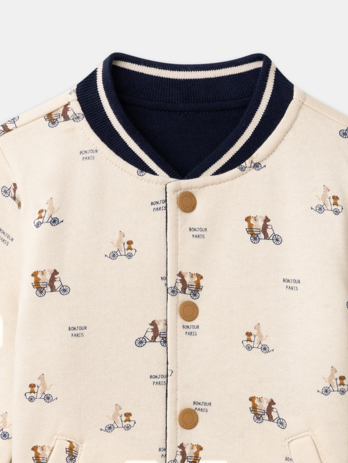 Teddy reversível azul marinho ou creme estampado com cães bebé rapaz
