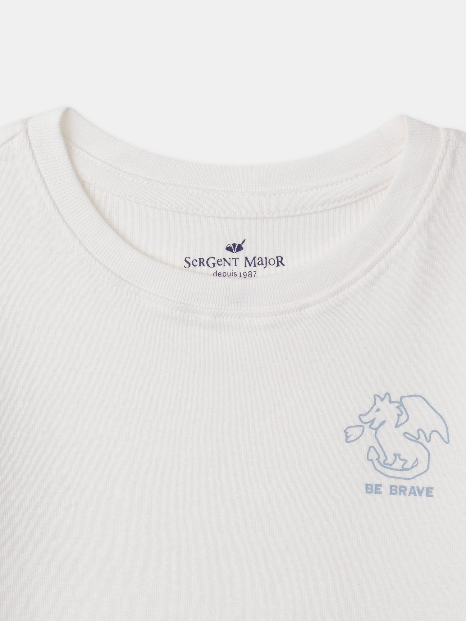 Lote de 2 t-shirts ecru com impressão de dragão ou listras azuis para menino